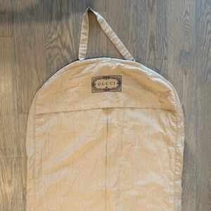 Gucci hanging garment bag. Brand new. Approximately 45”x26”